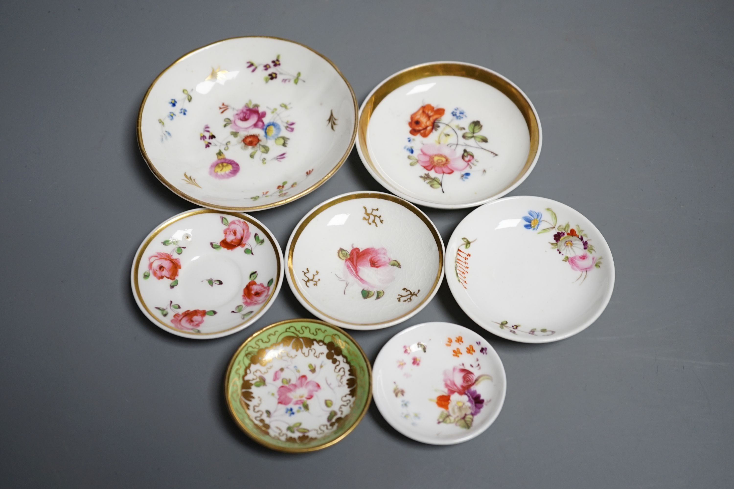 Seven Staffordshire or Alcock miniature teacups and saucers and a similar miniature mug, c.1815-20. Provenance - Mona Sattin collection of miniature cups and saucers, collection no.s 144, 148, 151, 152, 155, 161-163
